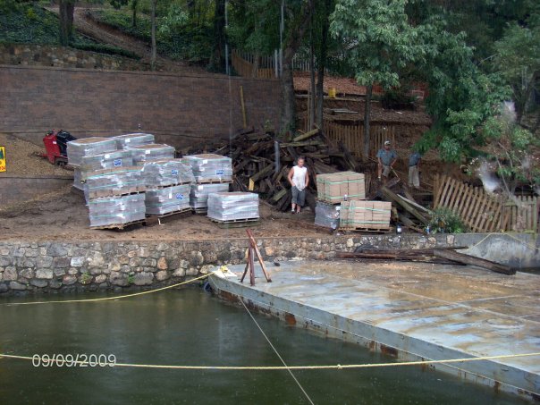 crew building a retaining wall