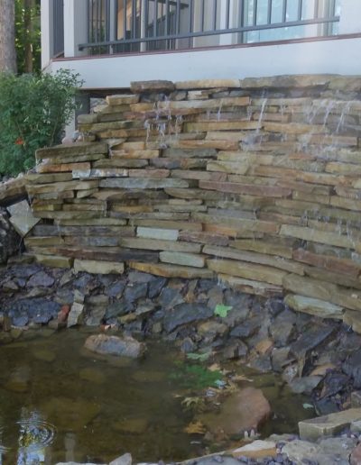 outdoor landscaping waterfall and pond